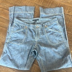 Banana Republic wide leg pants with yellow stitching.